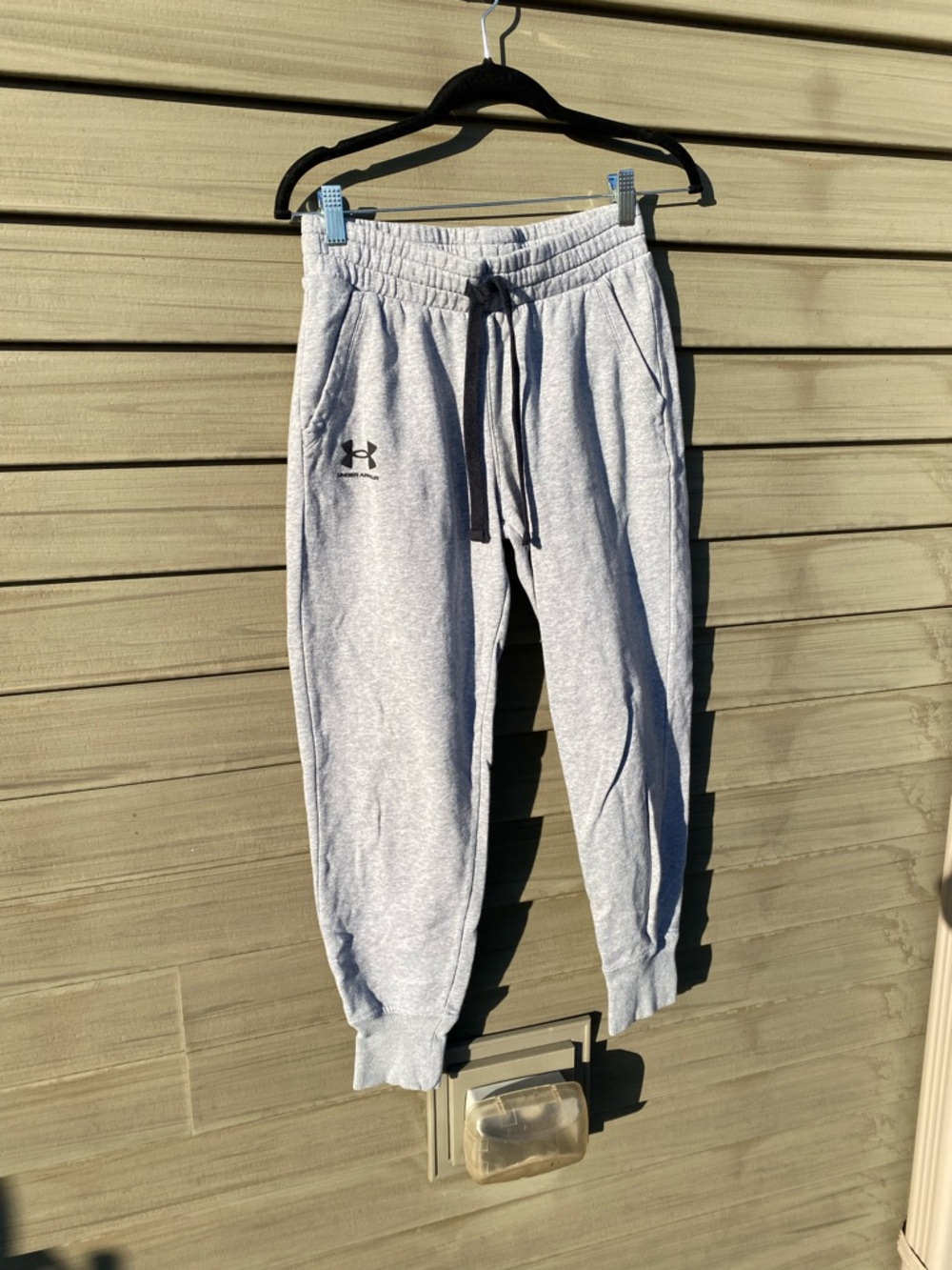 Woman’s under Armour gray jogger sweatpants